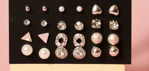 9-Pair Gold Toned Stud Earring Set - ORYX TREND EaringCollection: Comprehensive set of nine pairs of small stud earrings in gold tones.Default Title#