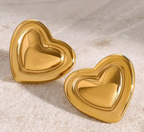 Bold Gold-Tone Stainless Steel Heart Stud Earrings - ORYX TREND EaringMake a statement with these chunky, high-polish heart stud earrings. Crafted from durable stainless steel, these earrings feature a bright gold tone and a dimensional, puffy heart shape. They are designed to be eye-catching yet comfortable for everyday wear. The stainless steel construction offers excellent resistance to tarnishing and rust.Default Title#