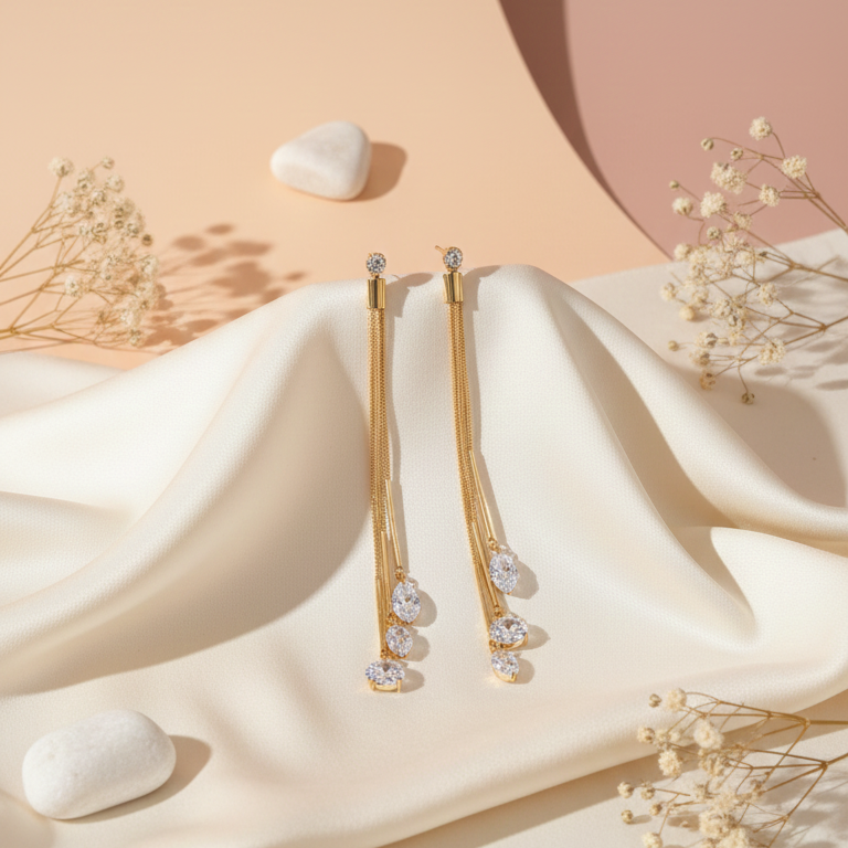 Dazzling CZ Dangle Chain Earrings - ORYX TREND EaringStep into the spotlight with these exquisite Dazzling CZ Dangle Chain Earrings. Featuring three cascading gold chains that end with brilliant, faceted Cubic Zirconia (CZ) stones, these long drop earrings add movement and sparkle to any look. The tassel design is lightweight and glamorous, perfect for weddings, parties, or special evenings. Style: Drop, Dangle, Tassel, Elegant, GlamourDefault Title#