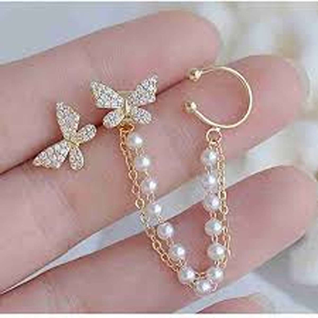Crystal Butterfly and Pearl Chain Ear Cuff Set - ORYX TREND EaringDesign: Asymmetrical set featuring a pave crystal butterfly stud connected by a double chain of delicate faux pearls to a simple ear cuff.Default Title#