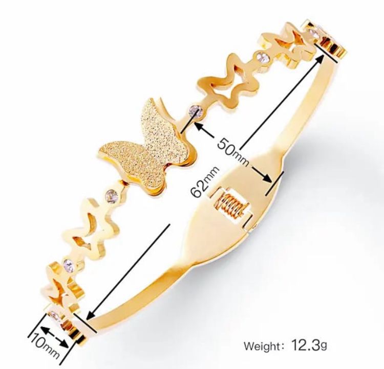 Dainty Gold Butterfly Cuff Bracelet with Crystal Accents - ORYX TREND BraceletsAn elegant gold-tone bangle bracelet featuring a central, intricately textured butterfly charm. The rest of the cuff is adorned with delicate cutout butterfly shapes, interspersed with small, sparkling crystal accents. This piece uses a durable, hinged clasp for secure and comfortable wear. It beautifully symbolizes transformation and grace, making it a perfect statement piece or a thoughtful gift.Default Title#