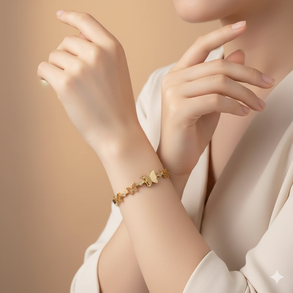 Dainty Gold Butterfly Cuff Bracelet with Crystal Accents - ORYX TREND BraceletsAn elegant gold-tone bangle bracelet featuring a central, intricately textured butterfly charm. The rest of the cuff is adorned with delicate cutout butterfly shapes, interspersed with small, sparkling crystal accents. This piece uses a durable, hinged clasp for secure and comfortable wear. It beautifully symbolizes transformation and grace, making it a perfect statement piece or a thoughtful gift.Default Title#