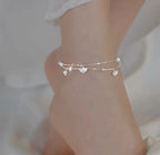 Dainty Silver Beaded Anklet with Ginkgo Charms - ORYX TREND AnkletAdorn your ankle with our minimalist ginkgo leaf charm anklet. The two-layered design includes a sleek chain and a beaded chain, each with tiny, intricate ginkgo leaves. This dainty and elegant piece is a stylish addition to your warm-weather jewelry collection.Default Title#