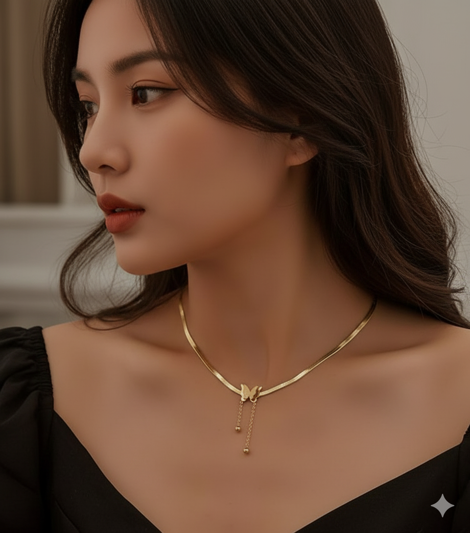 Delicate Gold Bow/Knot Lariat Y-Necklace with Tassel Drops - ORYX TREND NecklaceAn elegant, fine gold necklace featuring a central, feminine knot design from which two delicate tassels gently hang, perfect for a refined, classic look.Default Title#