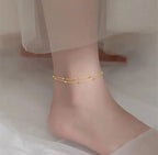 Double Layered Gold Beaded Anklet - ORYX TREND AnkletElevate your summer style with this elegant double-layered anklet. Featuring delicate gold chains adorned with polished ball beads, this minimalist ankle bracelet is the perfect accessory for adding a subtle touch of glamour to any outfit.Default Title#