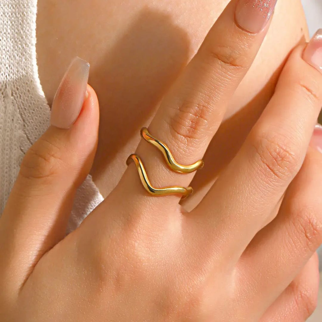 Double Wave Gold Ring - ORYX TREND RingA chic, open-style ring featuring two parallel wavy bands. This fluid design creates a stylish layered look with just one piece, perfect for everyday elegance.Default Title#