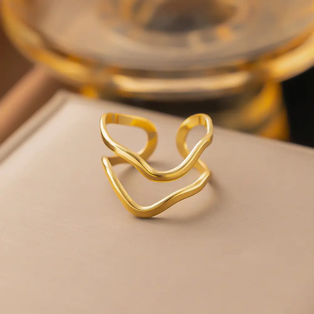 Double Wave Gold Ring - ORYX TREND RingA chic, open-style ring featuring two parallel wavy bands. This fluid design creates a stylish layered look with just one piece, perfect for everyday elegance.Default Title#