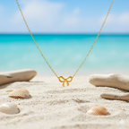 Elegant Gold Bow Pendant Necklace - ORYX TREND NecklaceA beautiful and classic necklace featuring a polished gold pendant shaped like a timeless bow. The delicate bow is suspended from a fine, matching gold chain, presented here in its signature blue jewelry box. Perfect for adding a touch of sophisticated charm to any outfit or as a thoughtful gift.Default Title#
