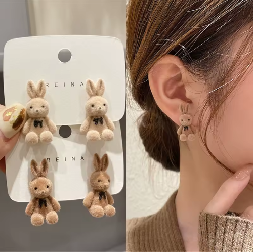 Fluffy Bunny Stud Earrings - ORYX TREND EaringAdorable Design: Charming stud earrings shaped like miniature, flocked or velvet-covered teddy bunnies with cute black bows.Default Title#