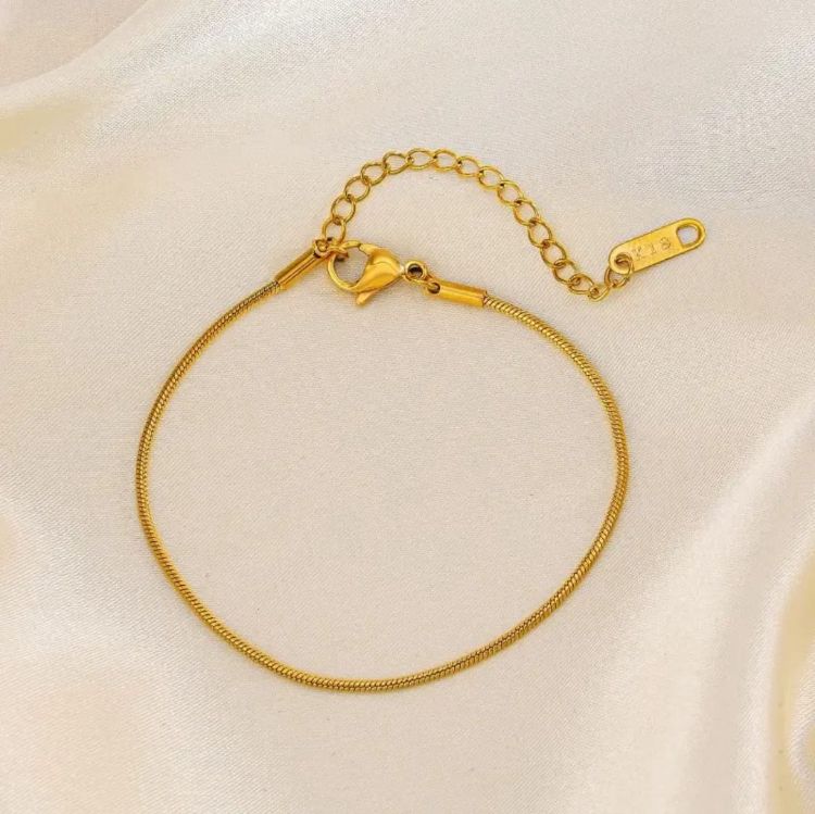 Gold Chain Anklet - ORYX TREND Anklethis delicate and chic gold chain anklet adds a subtle touch of elegance to any look. Its sleek and minimalist design makes it perfect for layering or wearing on its own. Crafted from durable material, this dainty gold anklet is an essential accessory for both casual and dressy occasions, offering a sophisticated shimmer with every step.Default Title#