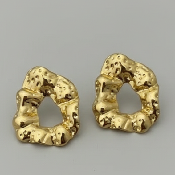 Statement Gold-Tone Molten Nugget Stainless Steel Earrings - ORYX TREND EaringA pair of bold and contemporary earrings featuring a distinctive, organic, "molten" texture. The abstract, irregular shape and hammered-look finish give them a high-fashion, artisanal appeal. Crafted from durable stainless steel and finished in a bright gold tone, these earrings are designed to be long-lasting and make a powerful statement. Perfect for adding a modern, sculptural touch to any outfit.Default Title#