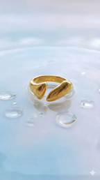 Gold Organic Nugget Open Ring - Sculptural Statement Jewelry - ORYX TREND RingEmbrace fluid design with the ORYX trend Gold Organic Nugget Open Ring. This stunning piece features two polished, abstract nugget shapes that almost touch, creating a dynamic, adjustable design. The smooth, high-shine gold finish gives it a luxurious, molten aesthetic. Perfect for those seeking bold yet sophisticated contemporary statement jewelry. Add this unique piece to your collection from ORYX trend.Default Title#