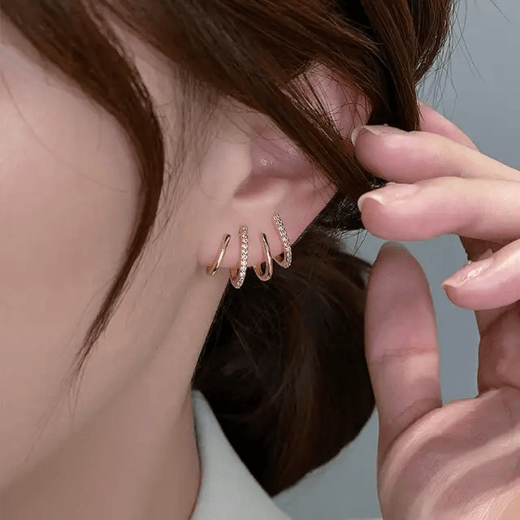 Prong Stud Earrings - ORYX TREND EaringUnique stud earrings featuring four curved, overlapping prongs or lines in a stylized claw shape.Default Title#