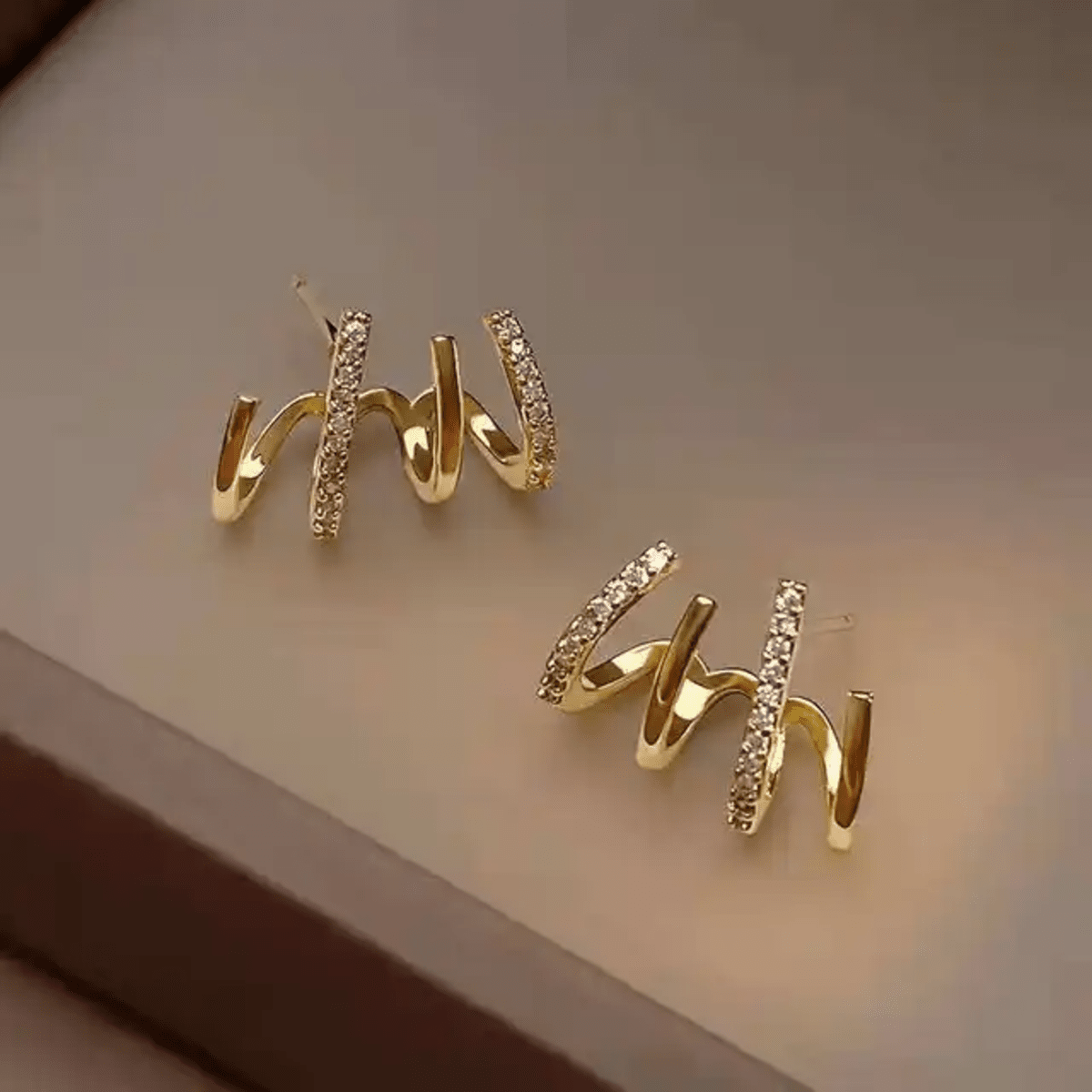 Prong Stud Earrings - ORYX TREND EaringUnique stud earrings featuring four curved, overlapping prongs or lines in a stylized claw shape.Default Title#
