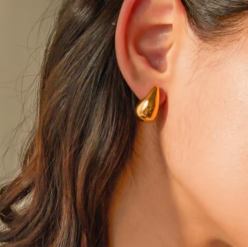 Gold Teardrop Stud Earrings - ORYX TREND EaringElevate your look with our ultra-modern, chunky Teardrop Stud Earrings. Inspired by liquid metal and contemporary sculpture, these stunning earrings deliver a bold, sophisticated statement with minimal effort.Default Title#