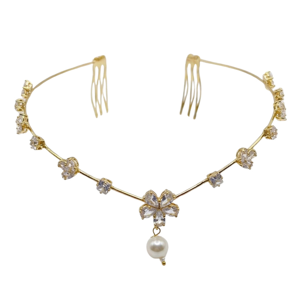Gold hair vine with floral and pearl details on a white background
