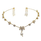 Gold hair vine with floral and pearl details on a white background