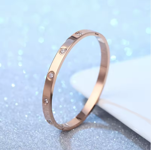 Minimalist Crystal Bangle Bracelet - ORYX TREND BraceletsSlim, polished rose gold-toned bangle bracelet (cuff) featuring evenly spaced set crystals/rhinestonesDefault Title#