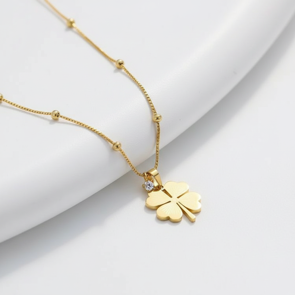 Minimalist Four-Leaf Clover Necklace for Women - ORYX TREND NecklaceOur new four-leaf clover necklace combines timeless design with a touch of luck. Featuring a stunning clover pendant and a minimalist beaded chain, this piece is a must-have for your jewelry collection. Made with high-quality, durable materials.Default Title#
