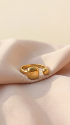 Modern Gold Open Signet Ring - Minimalist Cushion Design - ORYX TREND RingIntroduce effortless style with the ORYX trend Modern Gold Open Signet Ring. This piece updates the classic signet style with a smooth, cushioned square top and a chic, adjustable open band. Perfect for those who appreciate minimalist aesthetics with a bold touch. Its contemporary design makes it ideal for everyday wear or stacking with simple bands. Shop the latest in ORYX trend's modern gold jewelry collection.Default Title#