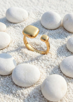 Modern Gold Open Signet Ring - Minimalist Cushion Design - ORYX TREND RingIntroduce effortless style with the ORYX trend Modern Gold Open Signet Ring. This piece updates the classic signet style with a smooth, cushioned square top and a chic, adjustable open band. Perfect for those who appreciate minimalist aesthetics with a bold touch. Its contemporary design makes it ideal for everyday wear or stacking with simple bands. Shop the latest in ORYX trend's modern gold jewelry collection.Default Title#