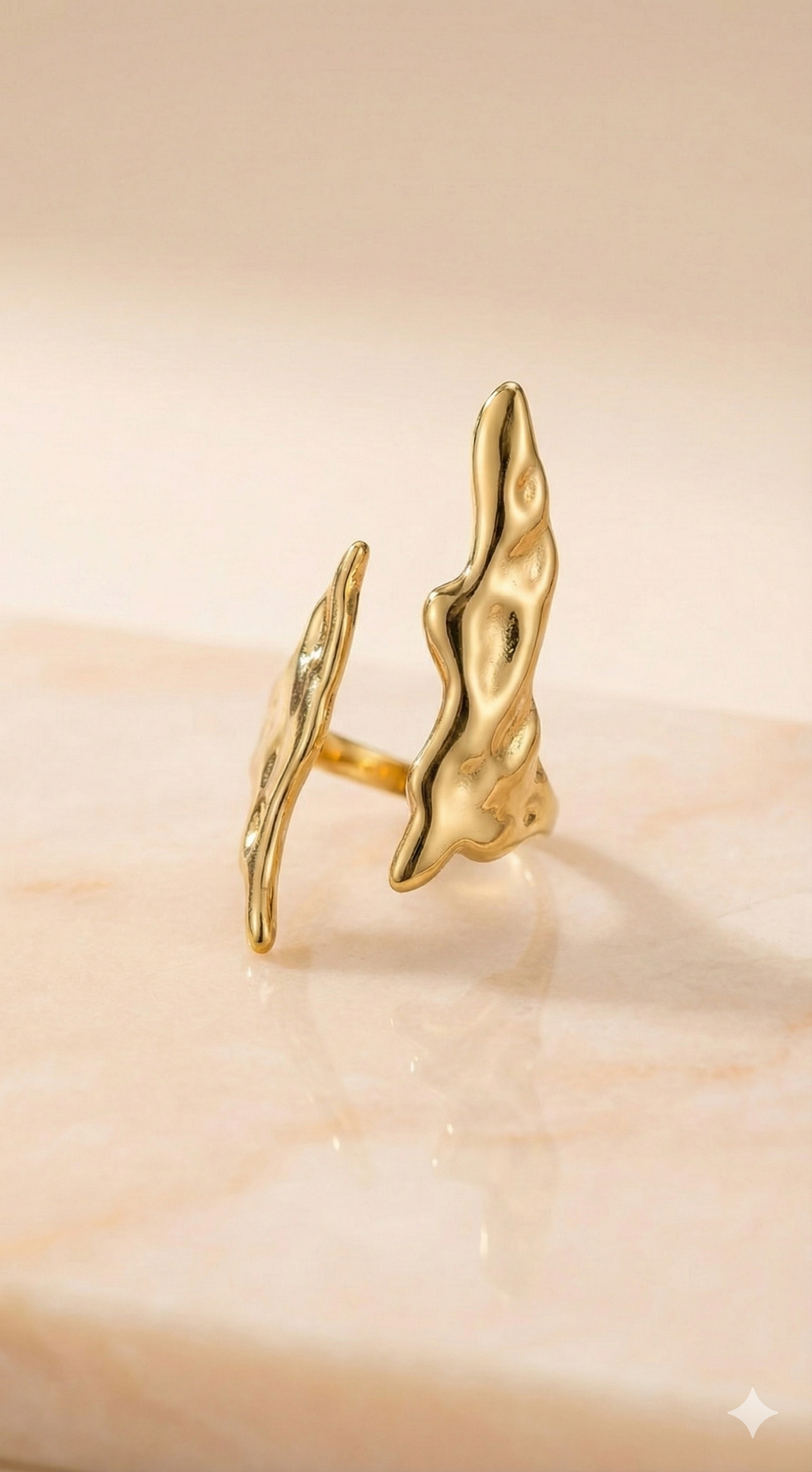 Molten Gold Open Cuff Ring - Organic Statement Jewelry - ORYX TREND RingEmbrace the beauty of imperfection with the ORYX trend Molten Gold Open Cuff Ring. This captivating piece features a unique, fluid, organic texture that mimics the look of cooled liquid gold. The adjustable open cuff design ensures a perfect fit, making it a comfortable and bold statement piece. Perfect for those who love nature-inspired yet contemporary gold jewelry. Discover your new favorite accessory from ORYX trend.Default Title#