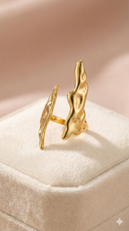 Molten Gold Open Cuff Ring - Organic Statement Jewelry - ORYX TREND RingEmbrace the beauty of imperfection with the ORYX trend Molten Gold Open Cuff Ring. This captivating piece features a unique, fluid, organic texture that mimics the look of cooled liquid gold. The adjustable open cuff design ensures a perfect fit, making it a comfortable and bold statement piece. Perfect for those who love nature-inspired yet contemporary gold jewelry. Discover your new favorite accessory from ORYX trend.Default Title#