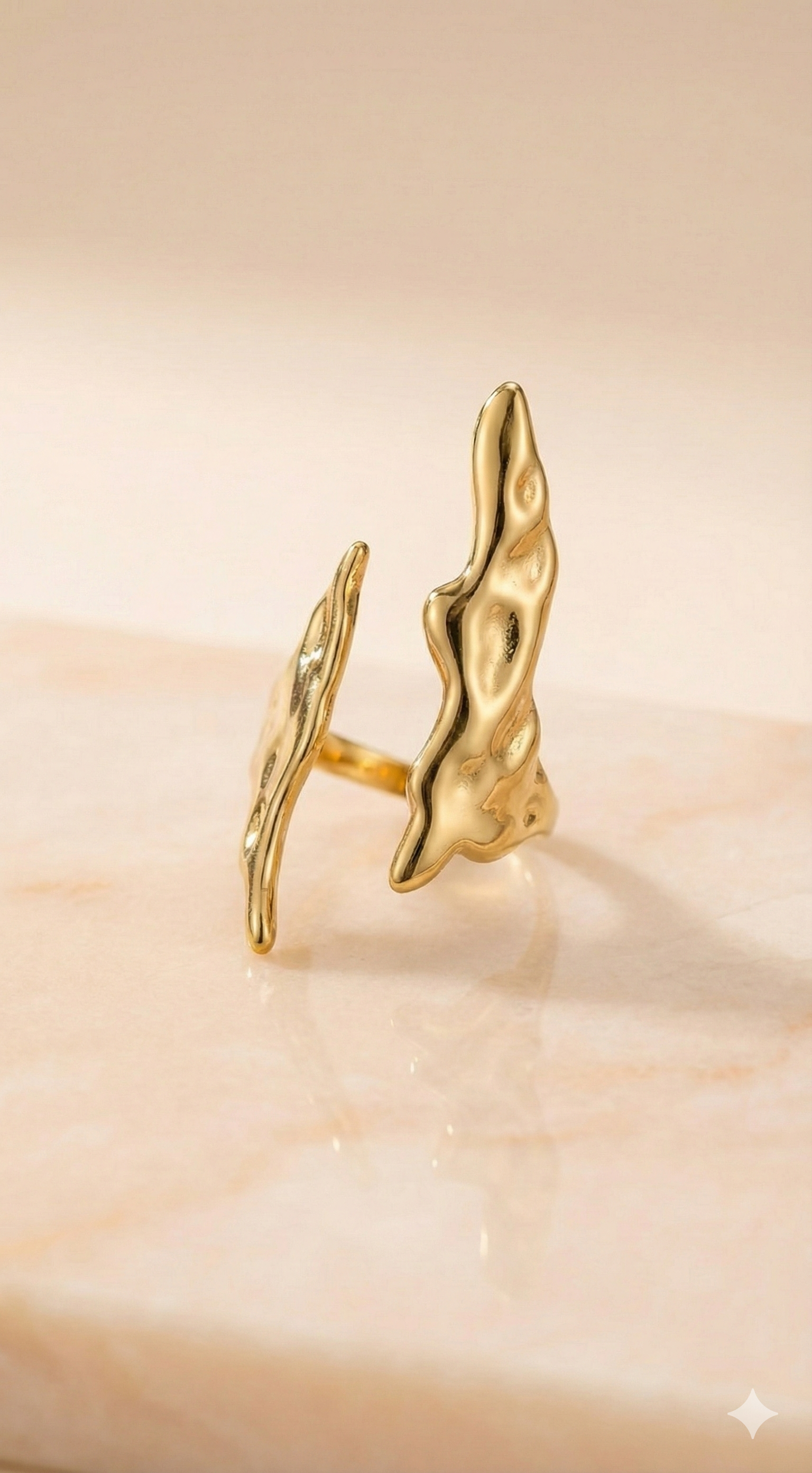 Molten Gold Open Cuff Ring - Organic Statement Jewelry - ORYX TREND RingEmbrace the beauty of imperfection with the ORYX trend Molten Gold Open Cuff Ring. This captivating piece features a unique, fluid, organic texture that mimics the look of cooled liquid gold. The adjustable open cuff design ensures a perfect fit, making it a comfortable and bold statement piece. Perfect for those who love nature-inspired yet contemporary gold jewelry. Discover your new favorite accessory from ORYX trend.Default Title#