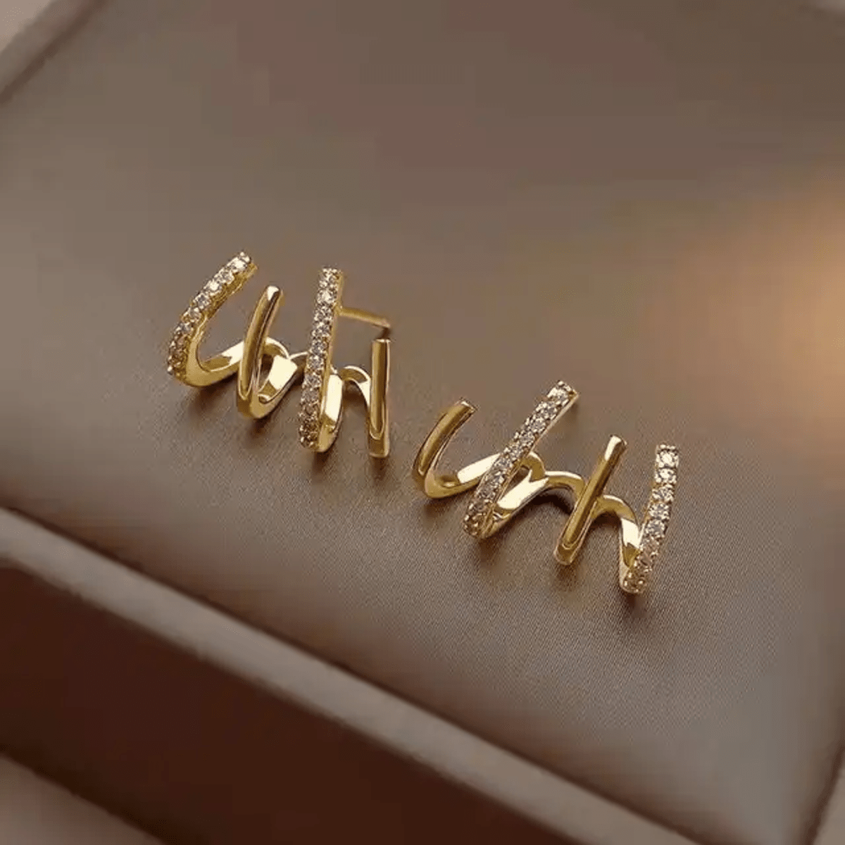 Prong Stud Earrings - ORYX TREND EaringUnique stud earrings featuring four curved, overlapping prongs or lines in a stylized claw shape.Default Title#