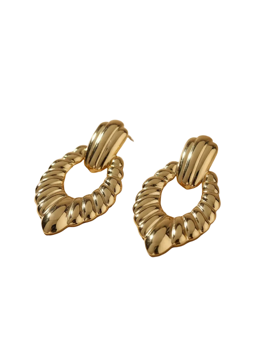 Statement Gold-Tone Croissant Textured Drop Earrings - ORYX TREND EaringMake a bold impact with these unique drop earrings. They feature a chunky, highly textural design, often referred to as a "croissant" or ribbed texture, in a rich gold tone. The earrings are secured with a simple, polished stud or post back. Made from durable stainless steel, these fashionable pieces are resistant to tarnishing, offering a high-end look with long-lasting quality. Perfect for elevating any outfit.Default Title#