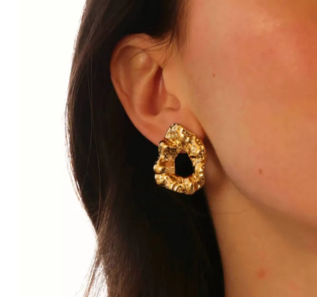 Statement Gold-Tone Molten Nugget Stainless Steel Earrings - ORYX TREND EaringA pair of bold and contemporary earrings featuring a distinctive, organic, "molten" texture. The abstract, irregular shape and hammered-look finish give them a high-fashion, artisanal appeal. Crafted from durable stainless steel and finished in a bright gold tone, these earrings are designed to be long-lasting and make a powerful statement. Perfect for adding a modern, sculptural touch to any outfit.Default Title#