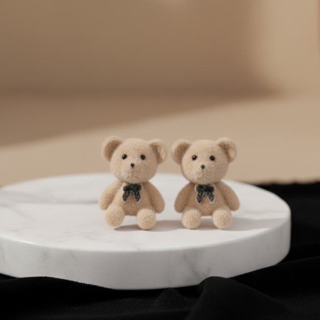 Flocked Teddy Bear Stud Earrings - ORYX TREND EaringAdorable, miniature teddy bear stud earrings covered in a soft, fuzzy flocked (velvet) texture and finished with a tiny black bow tie.Default Title#