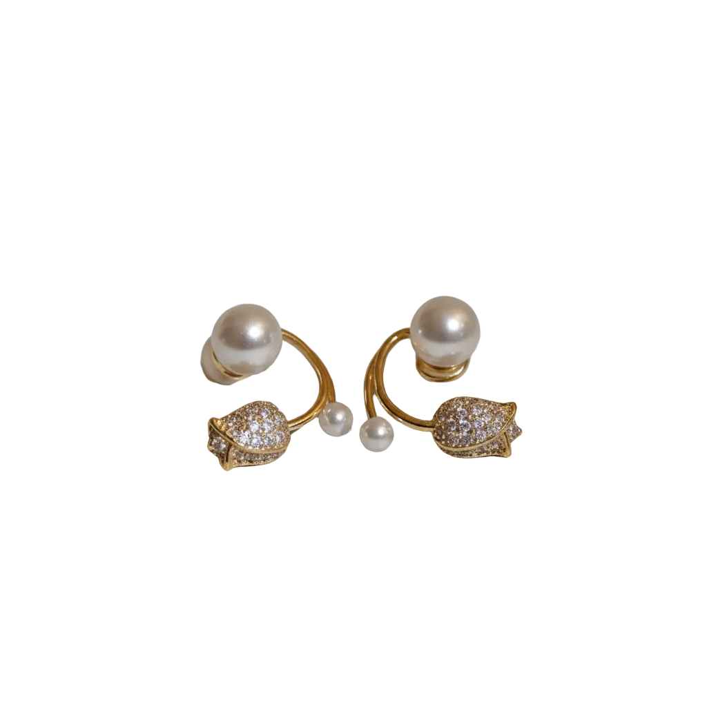 Tulip and Pearl Ear Jacket Studs - ORYX TREND EaringUnique ear jackets featuring a pave crystal tulip/flower stud with a curved gold bar that sits behind the lobe, tipped with graduated faux pearls.Default Title#
