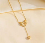 Elegant Gold Bow and Heart Pendant Necklace